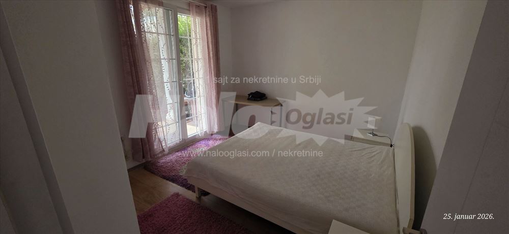 Dvosoban stan u kući sa dvorištem — 11
