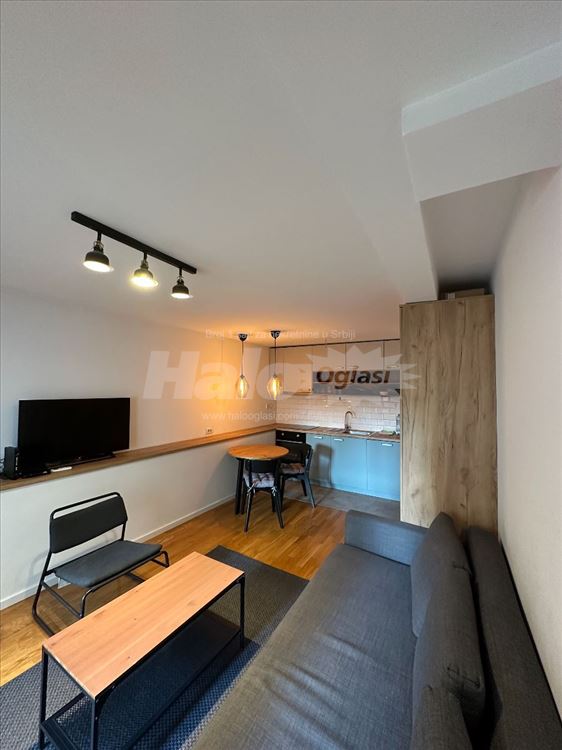 Garsonjera 30m2 u novogradnji -  velika terasa — 2