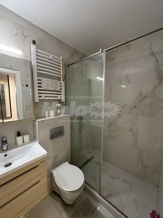 Garsonjera 30m2 u novogradnji -  velika terasa — 5