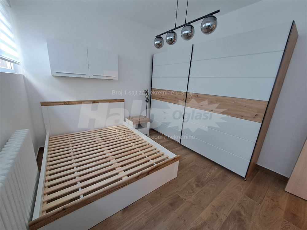 Odmah useljiv, kompletno renoviran trosoban stan 6 — 9