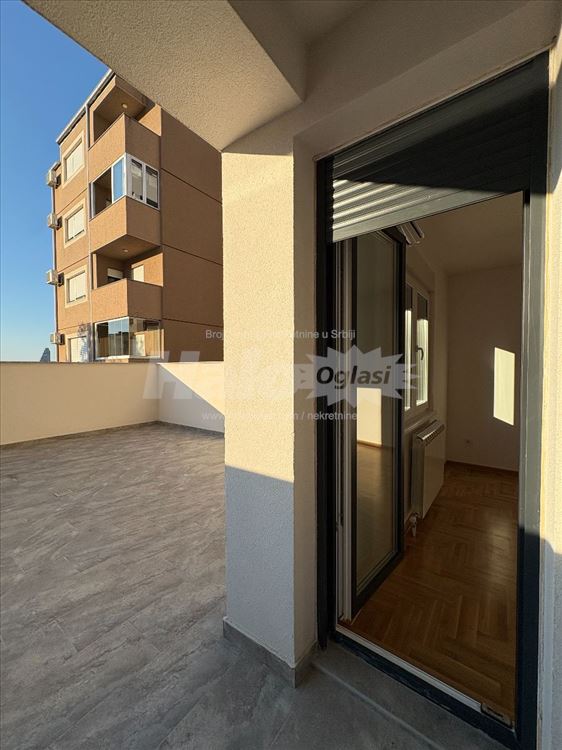 Stan 36m² + terasa 25m2 + garazno mesto — 15
