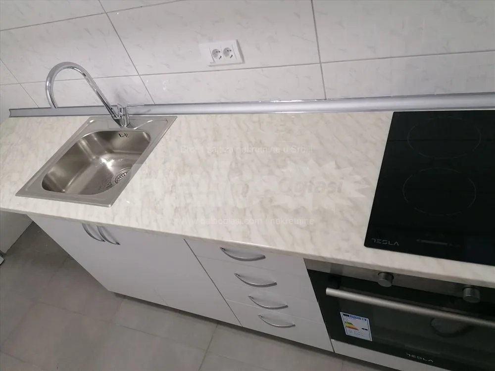 Stan u kući, prizemlje, renoviran — 7